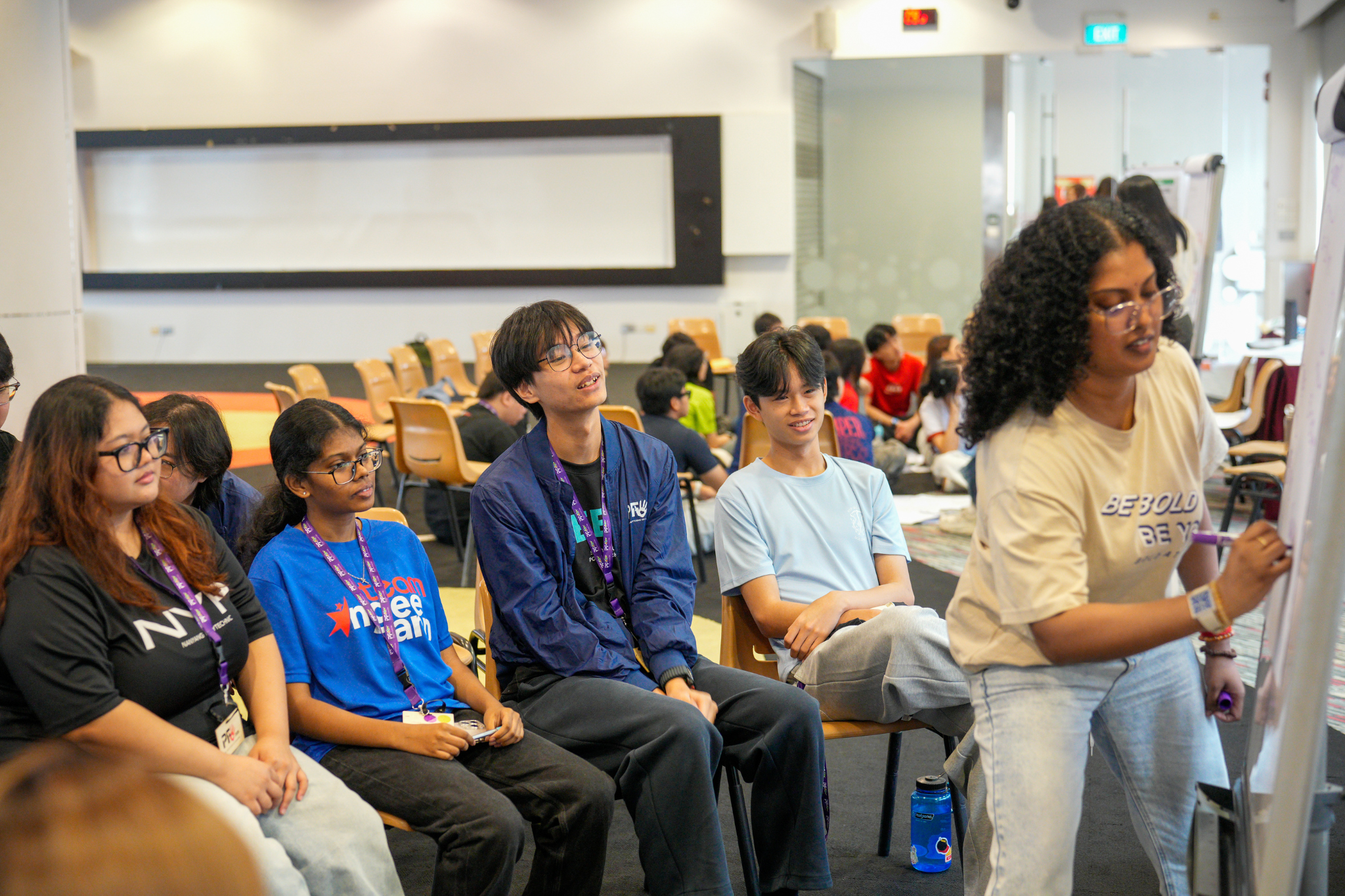 Student delegates discuss and organise insights gathered from their street interviews during Polytechnic Forum 2026.